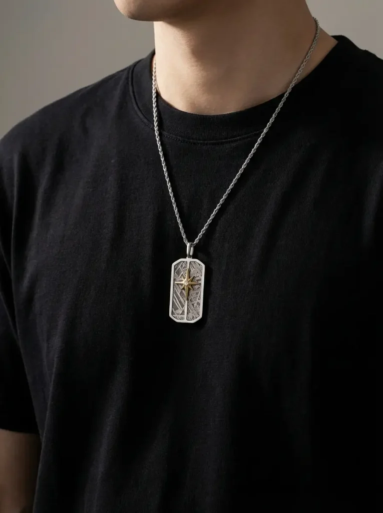 The North Star Aletai meteorite star pendant worn by model